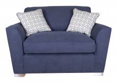 Pictured in Cosmo Navy with Salute Silver pattern scatter cushions and Chrome feet