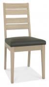 The Bentley Designs Oakham Scandi Oak Chair - Dark Grey Faux Leather 