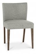 The Bentley Designs Turin Dark Oak Low Back Uph Chair in Pebble Grey Fabric