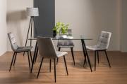 The Bentley Designs Martini Clear Tempered Glass 6 Seater Dining Table & 4 Mondrian Grey Velvet Fabric Chairs with Sand Black Powder Coated Legs
