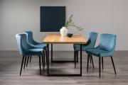 The Bentley Designs Ramsay Rustic Oak Effect Melamine 6 Seater Dining Table with U Leg & 4 Cezanne Petrol Blue Velvet Fabric Chairs with Sand Black Powder Coated Legs