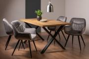The Bentley Designs Ramsay Rustic Oak Effect Melamine 6 Seater Dining Table with X Leg & 4 Dali Grey Velvet Fabric Chairs with Sand Black Powder Coated Legs 