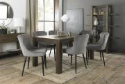 The Bentley Designs Turin Dark Oak 6-10 Seater Table & 8 Cezanne Velvet Grey Chairs with Sand Black Powder Coated Legs
