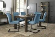 The Bentley Designs Turin Dark Oak 6-8 Seater Table & 6 Lewis Petrol Blue Velvet Fabric Cantilever Chairs with Sand Black Powder Coated Frame
