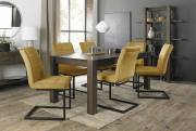 The Bentley Designs Turin Dark Oak 6-10 Seater Table & 6 Lewis Mustard Velvet Fabric Cantilever Chairs with Sand Black Powder Coated Frame