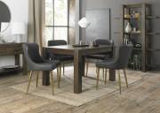 The Bentley Designs Turin Dark Oak 4-6 Seater Table & 4 Cezanne Dark Grey Faux Leather Chairs with Matt Gold Plated Legs