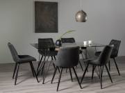 The Bentley Designs Miro Clear Tempered Glass 6 Seater Dining Table & 6 Seurat dark Grey Faux Suede Fabric Chairs with Sand Black Powder Coated Legs