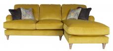 Pictured in Jedi Mustard, scatter cushions in Sublime Asphalt and Courture Multi and Limed Oak Turned legs