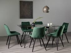 The Bentley Designs Miro Clear Tempered Glass 6 Seater Dining Table & 6 Seurat Green Velvet Fabric Chairs with Sand Black Powder Coated Legs 