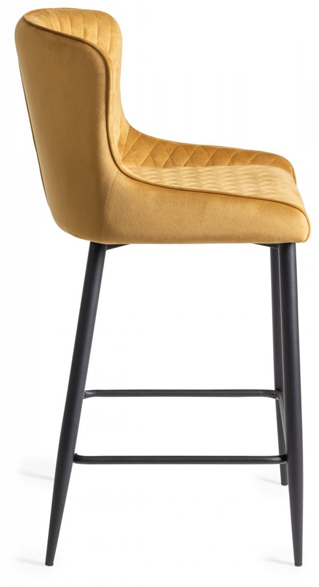 The Bentley Designs Cezanne Mustard Velvet Fabric Bar Stool with Sand Black Powder Coated Legs