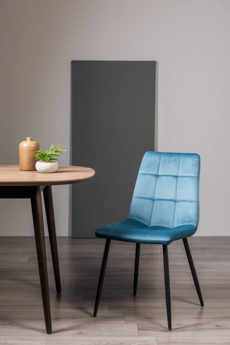 The Bentley Designs Mondrian Petrol Blue Velvet Fabric Chair on Display 