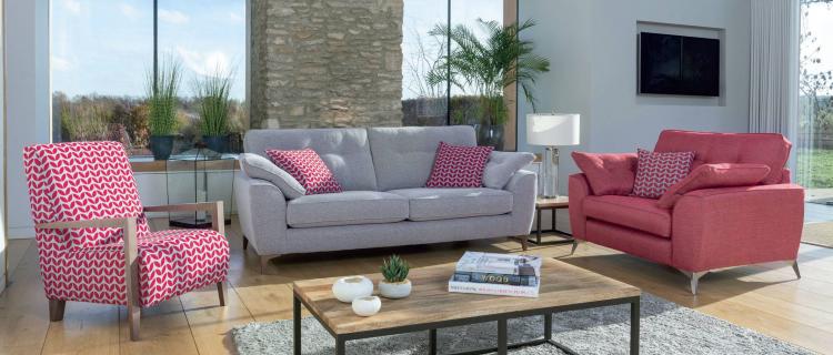 Grand sofa in fabric 9217 with large scatter cushions in 9011. Snuggler in fabric 9501 with small scatter cushion in 9011. Accent chair in fabric 9011