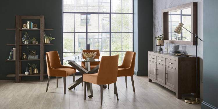 The Bentley Designs Turin Dark Oak Circular Glass Table on Display 