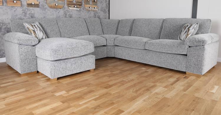 Large corner chaise group shown in room setting 