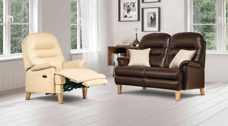 Classic power recliner chair pictured with 2 seater sofa