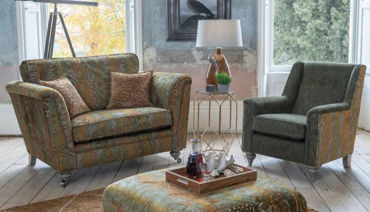 Alstons Darwin accent chair in fabric 5770, contrasting outside arm in 5000
