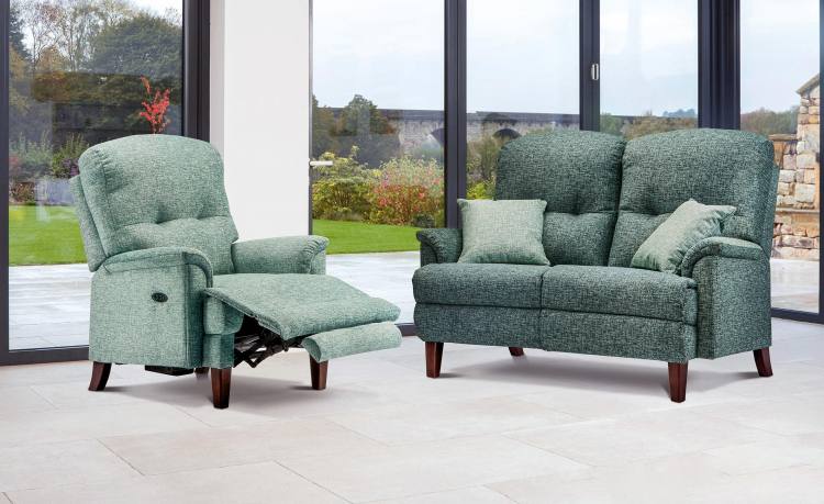 Sofa shown with power chair in Adriatic Mint fabric 
