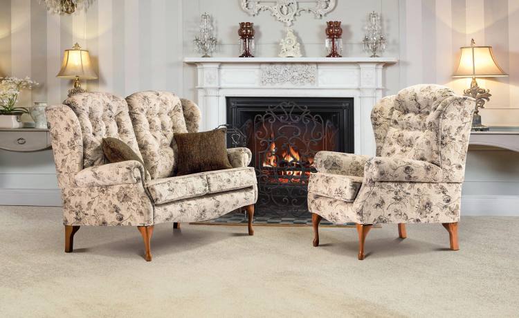 Chair shown with settee in Ellesmere Stone fabric 
