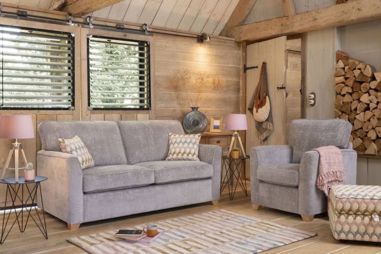 Reuben 3 seater sofa in fabric 1817, small scatter cushions in 1069, light feet. Reuben Chair in fabric 1817, light feet. Storage stool in fabric 1069 (supplied on glides).