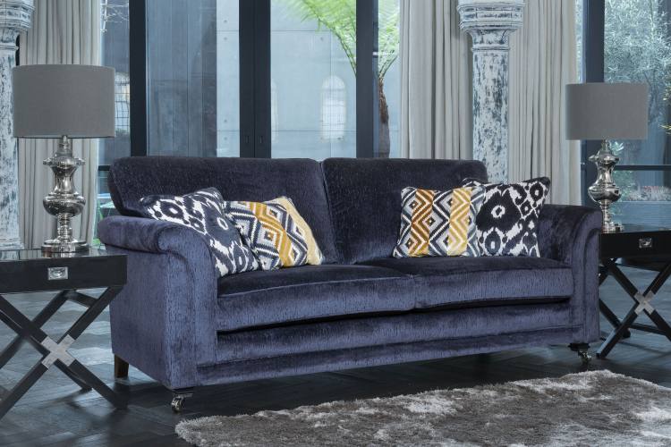 Pictured in fabric 2962, large scatter cushions in 2422, small scatter cushions in 2302, ebony/polished chrome castor legs (FM2).