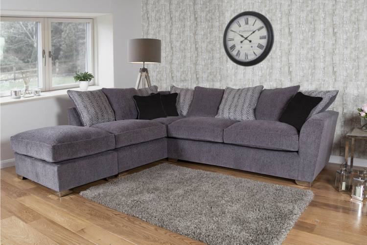 Pictured in Lassie Charcoal with Valencia Zig Zag Silver pillow back cushions, Festival Black scatter cushions and Chrome feet
