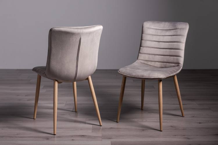 Bentley Designs Eriksen Grey Velvet Fabric Chairs on Display