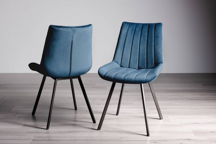 Bentley Designs Fontana Blue Velvet Fabric Chairs on Display 