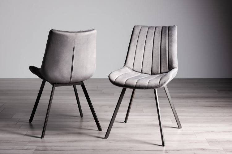 Bentley Designs Fontana Grey Velvet Fabric Chairs on Display