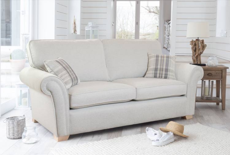Sofabed in 3928 fabric with scatters in 3507