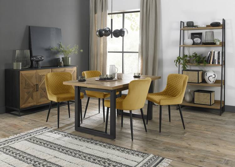 Bentley Designs Cezanne Mustard Velvet Fabric Chair on Display with Dining Table 
