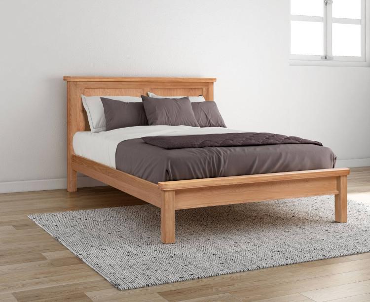 Bedstead shown in a room setting 