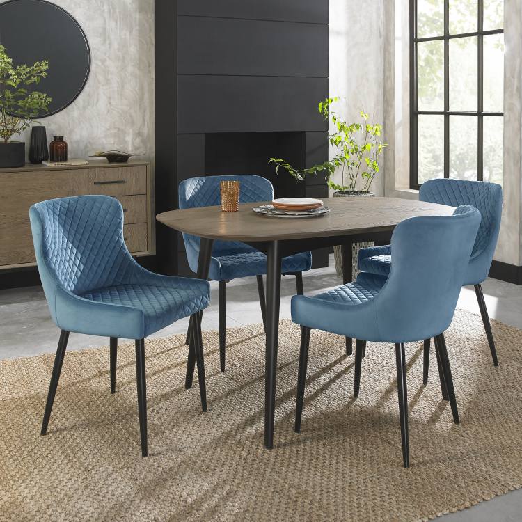 Bentley Designs Cezanne Petrol Blue Velvet Fabric Chair on Display with Dining Table 